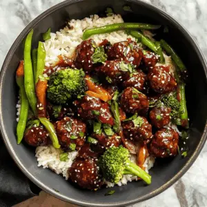Looking for a quick and delicious meal? These 30-minute Mongolian Beef Meatballs are packed with tender beef and a sweet, savory sauce that will satisfy your taste buds. Perfect for busy weeknights or a cozy dinner, make sure to save this recipe for your next culinary adventure! Enjoy the flavors of Mongolia right at home!