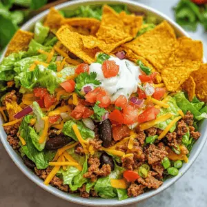 Looking for a fun and tasty twist on traditional salad? This Doritos Taco Salad packs a punch with zesty flavors and crunchy Doritos for the perfect texture. Loaded with fresh veggies, seasoned meat, and creamy dressing, it's a hit for gatherings or weeknight dinners. Save this recipe for your next taco night and enjoy a delicious change!