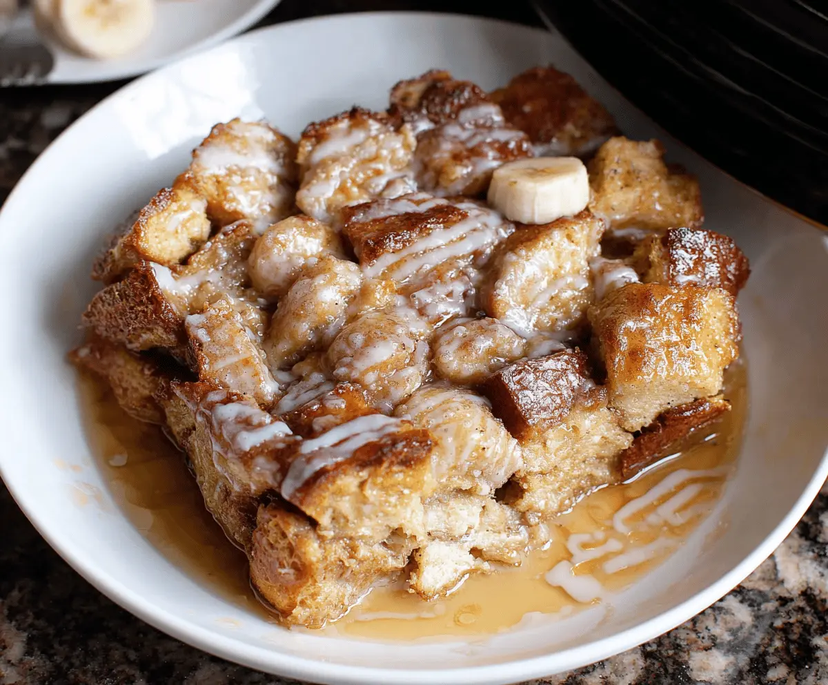 Delicious slow cooker French toast casserole topped with fresh berries and syrup.
