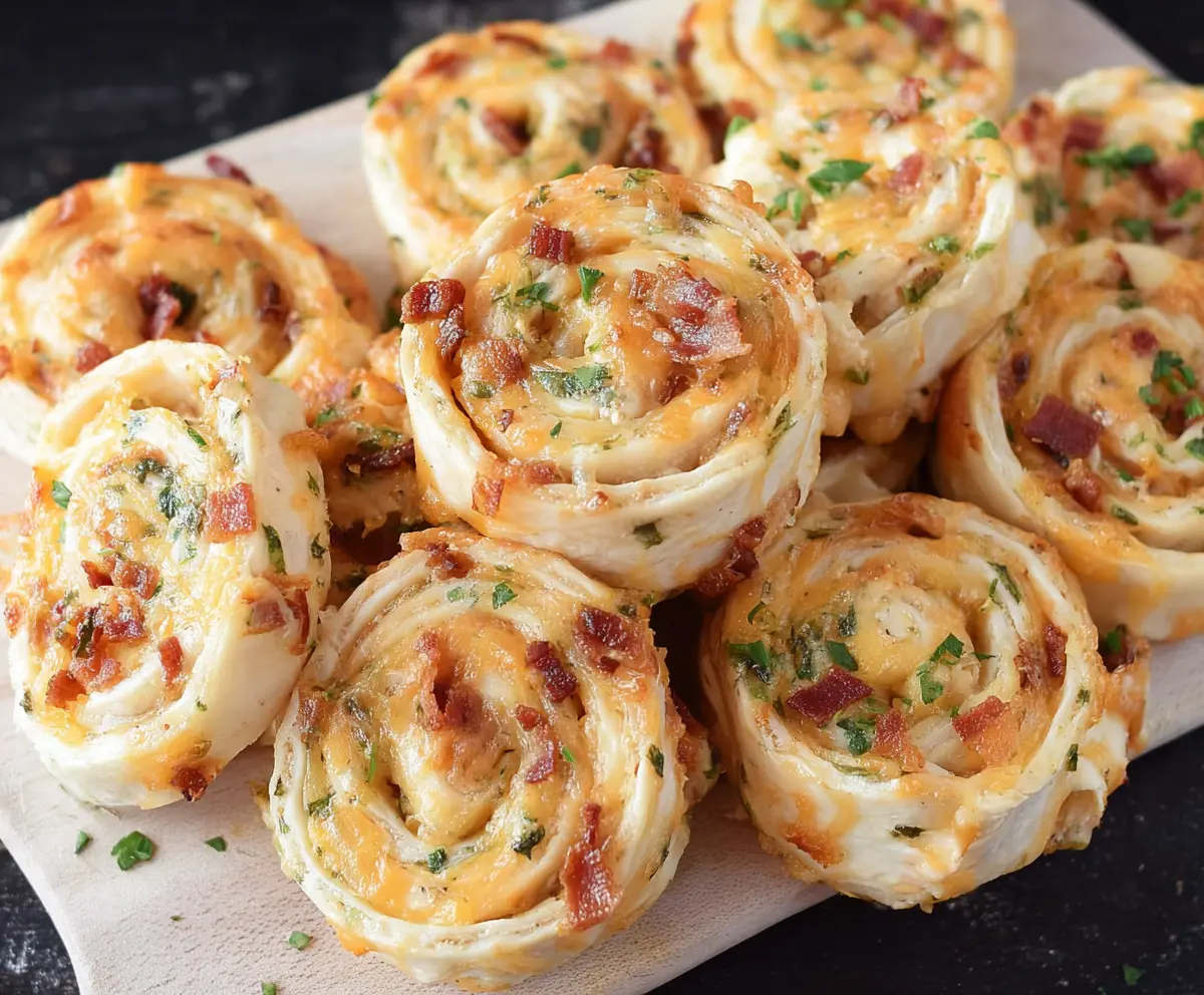 Delicious Crack Chicken Pinwheels with creamy filling and golden pastry rolls.