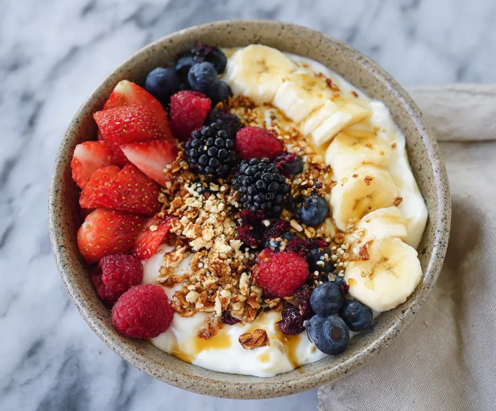 Healthy Greek Yogurt Protein Bowl with fresh berries and nuts for a nutritious breakfast