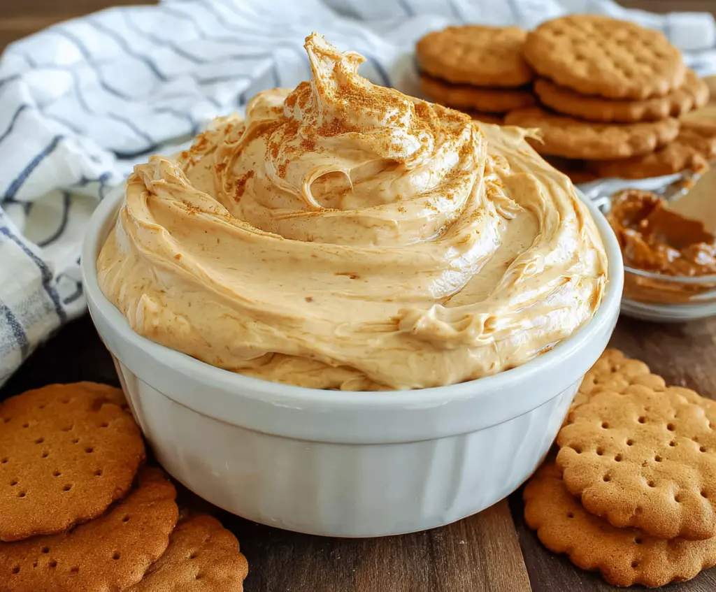 Creamy cookie butter dip served with cookies for a delicious treat