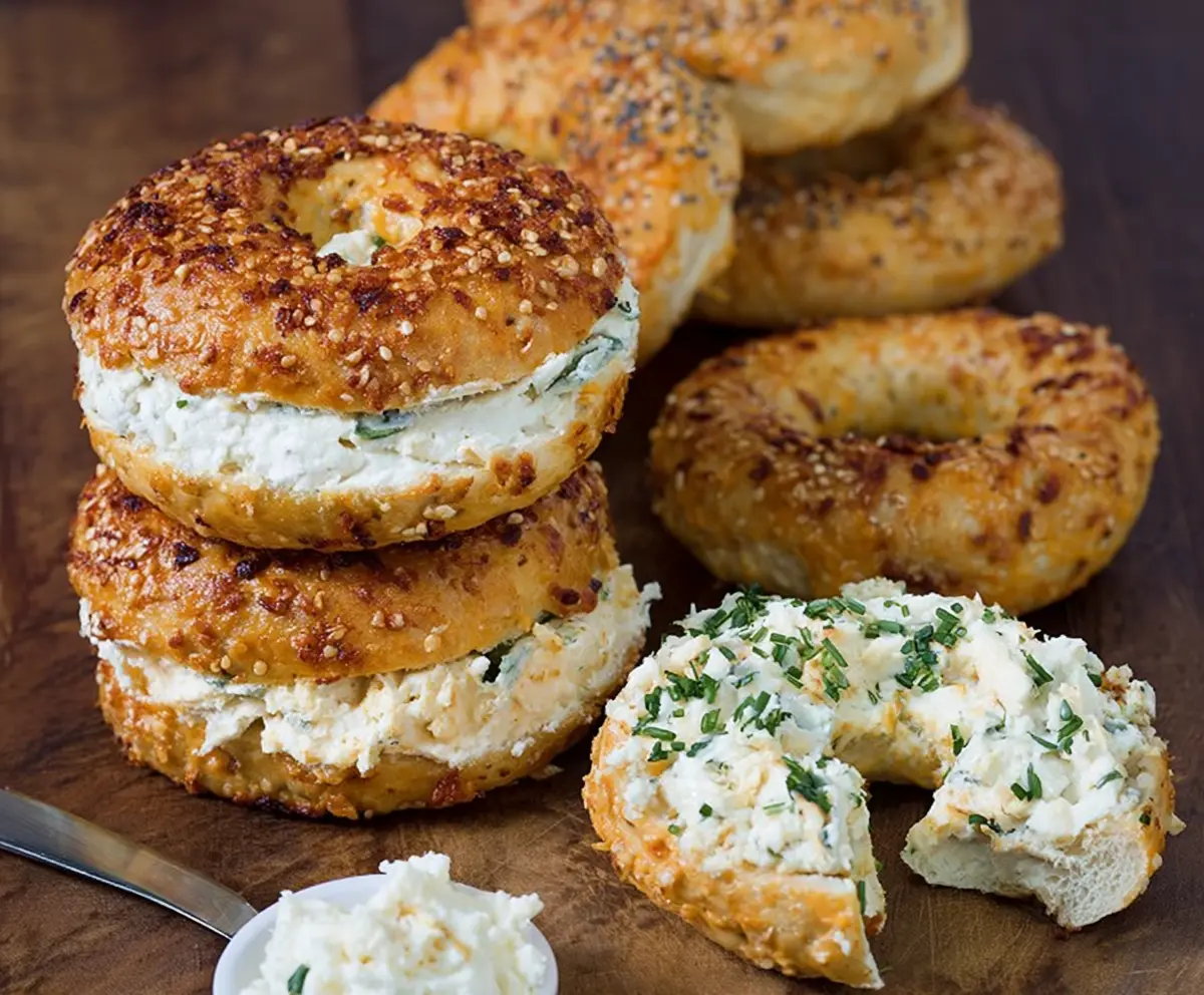 Delicious creamy cheddar bagels with a golden crust, perfect for breakfast or snack time.